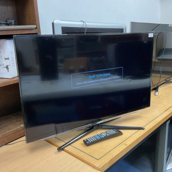 Samsung 37 inch HD television with remote control for home entertainment.
