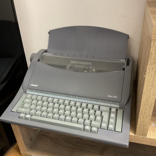Vintage Olivetti Dora 201 electric typewriter in as-found condition.