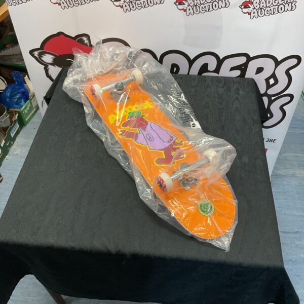 New skateboard with Tensor trucks in packaging.