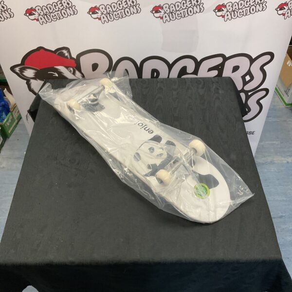 New Enjoi skateboard with tensor trucks, ready for street skating.