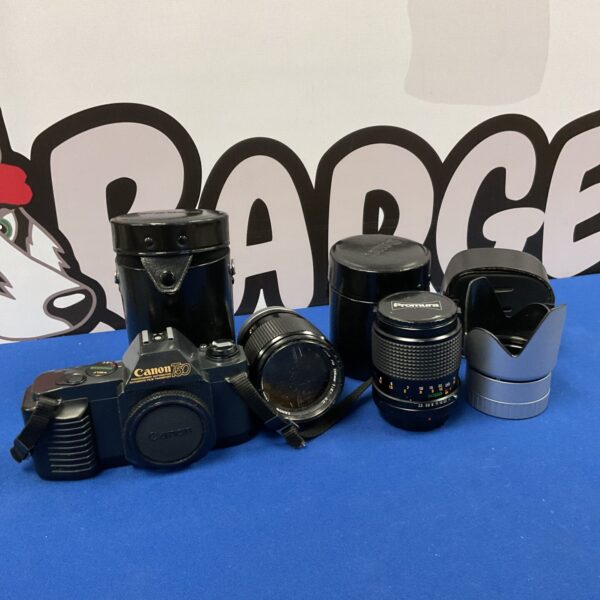 Vintage Canon T50 camera with lenses for film photography.