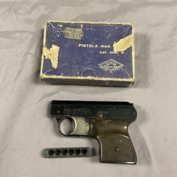 Vintage Mondial starting pistol, black grip, collectible firearm.