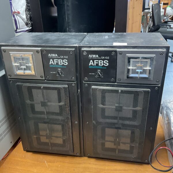 Vintage Aiwa SX-E12 speakers with woodgrain finish.