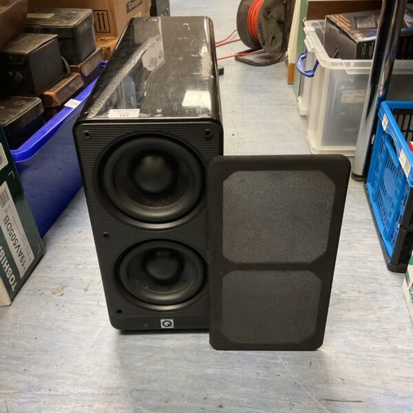 Front view of a black Q Acoustics subwoofer.