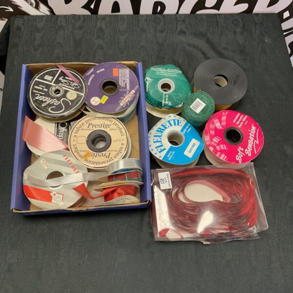 Vintage ribbon lot with assorted colours and patterns.