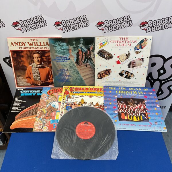 Lot of vintage Christmas vinyl records for collectors.