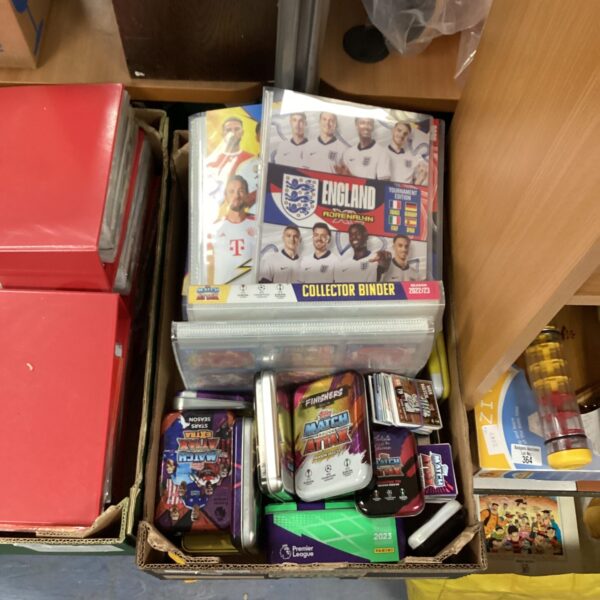 Large lot of football cards and albums for collectors.