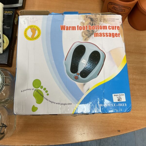 Close-up of the Lc-803 foot massager, a home therapy device.