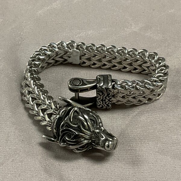 Detailed stainless steel wolf head bracelet, gothic jewellery.