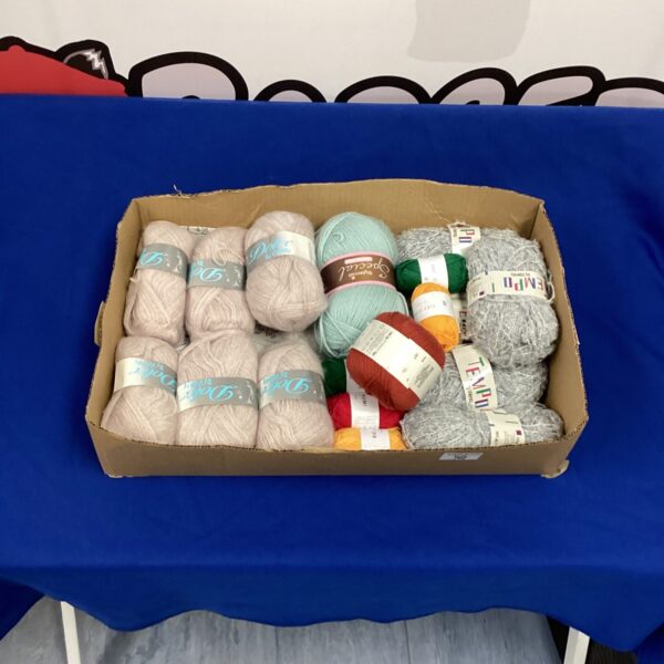 Pastel coloured Dolce knitting wool lot for crafting projects.