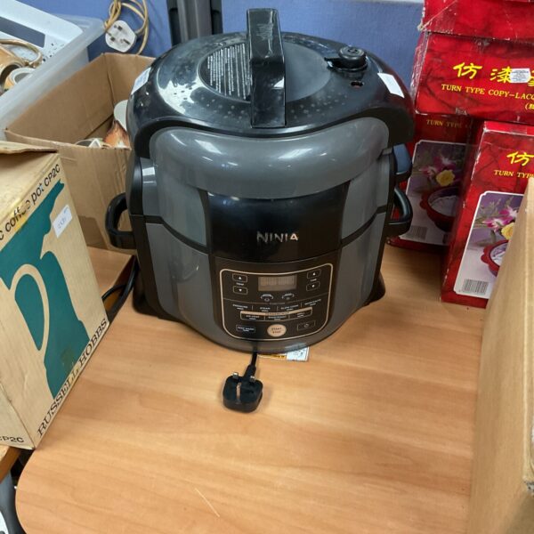 Silver Ninja Foodi Max multi cooker with digital display.