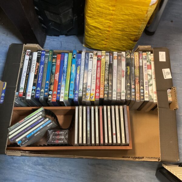 Mixed lot of DVDs and CDs for collectors and enthusiasts.