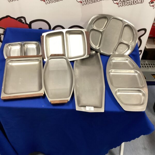 Lot of three stainless steel serving trays for catering.