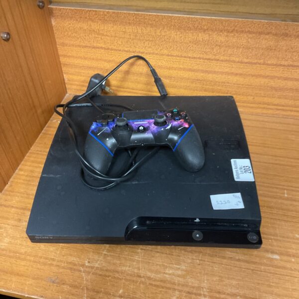 Sony PS3 Slim console with controller for retro gaming.