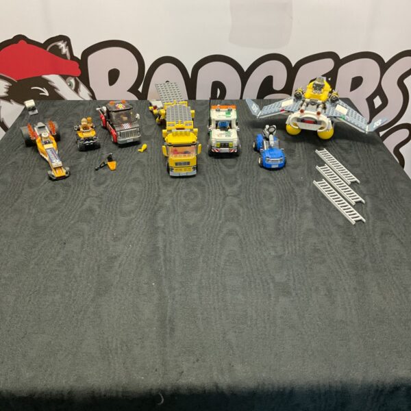 Mixed Lego figures and vehicles in a colourful collection.