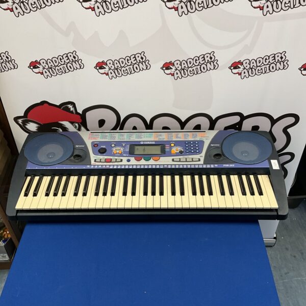 Vintage Yamaha PSR-262 keyboard with keys and controls visible.