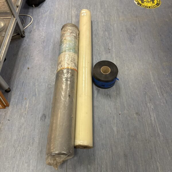 Assorted roofing underlayment rolls for construction projects.