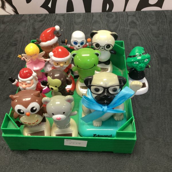 Lot of colourful solar powered animal toys.