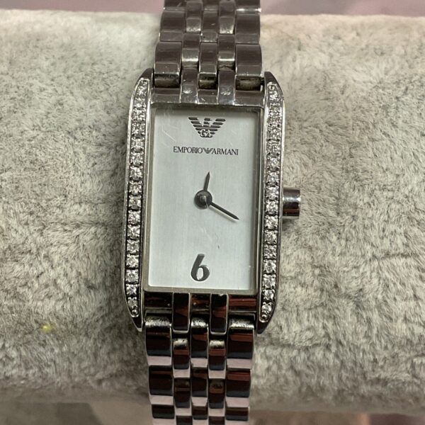 Close-up of an Emporio Armani diamond set ladies wristwatch.