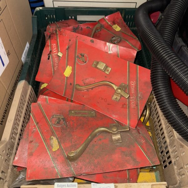 Assorted vintage door and gate hardware in a metal tray.