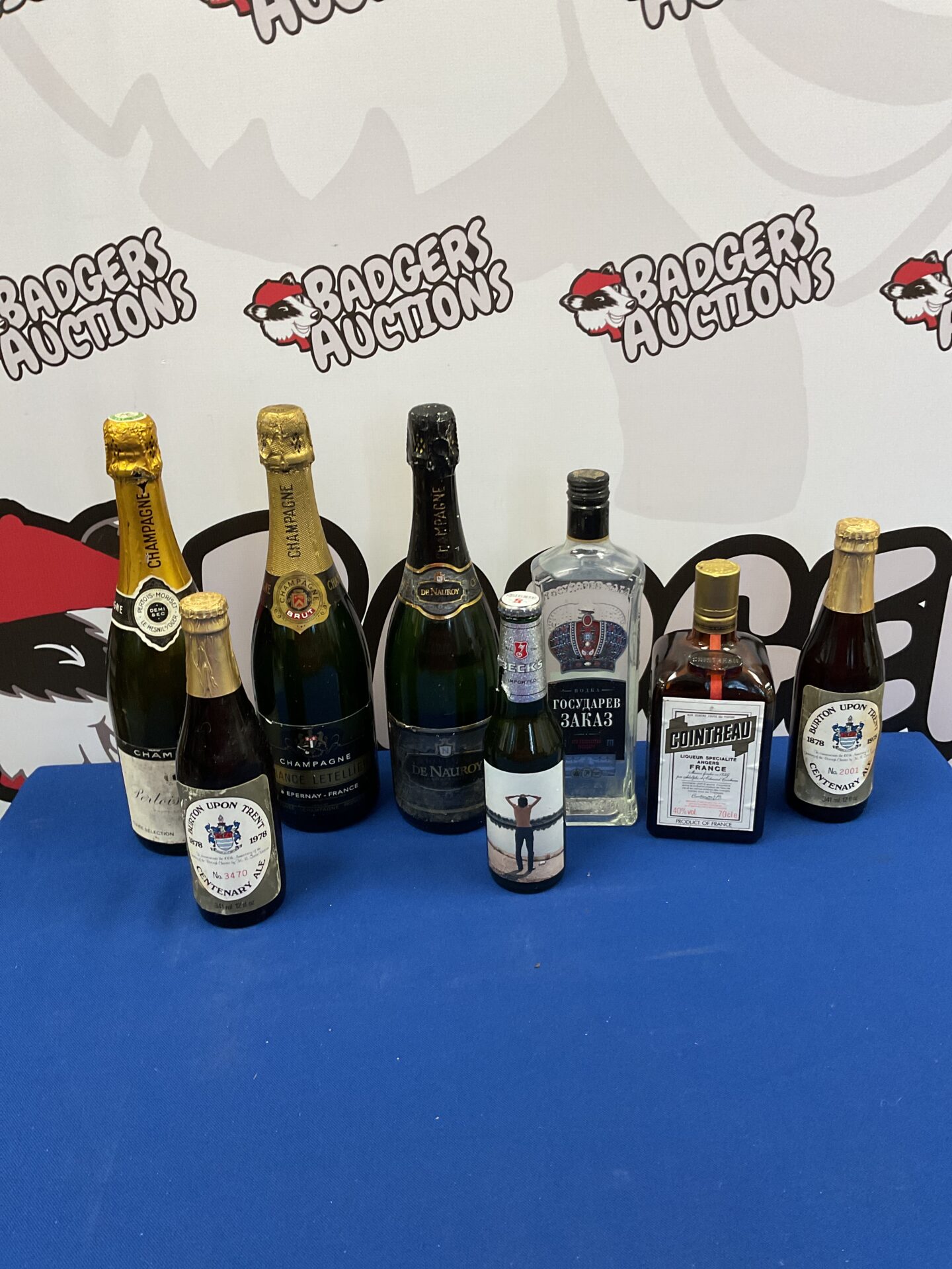 708 Box of mixed bottles of alcohol including vodka & devnauroy champagne