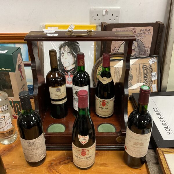 Vintage wine Tantalus with 1969 Mercurey bottle displayed.