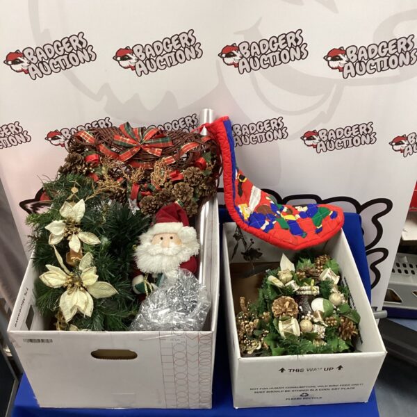 Vintage Christmas decorations lot with greenery and ribbons.
