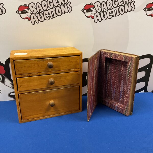 Vintage oak stationary drawers with patterned lining.