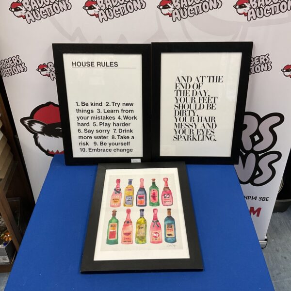 Framed prints set including house rules and cat bottle art.