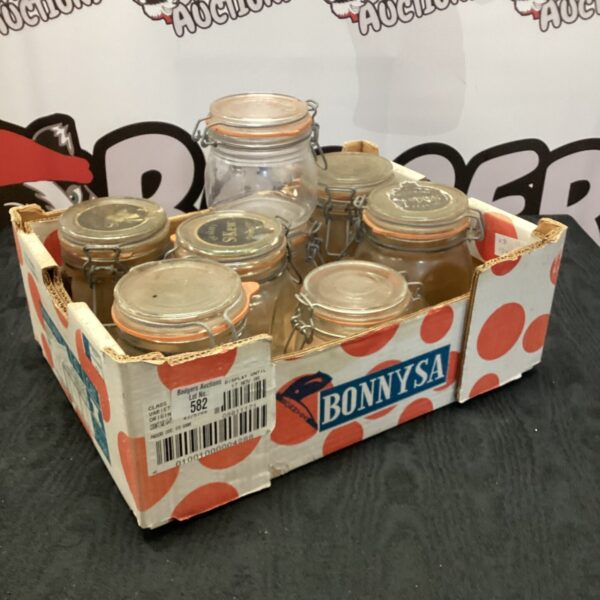 Tray of eight vintage Kilner jars for preserving and storage.