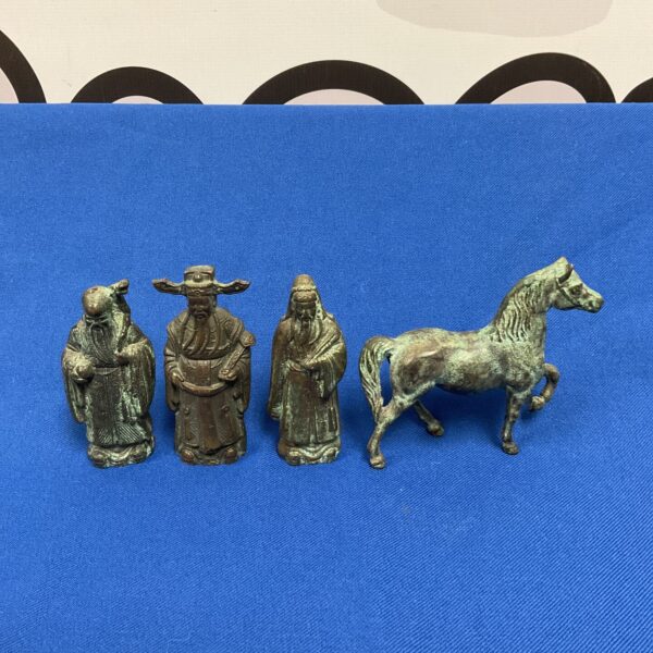 Antique Chinese bronze figures of wise men and a horse.