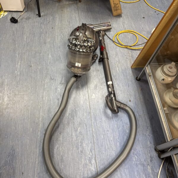 Front view of a grey Dyson DC54 upright vacuum cleaner.