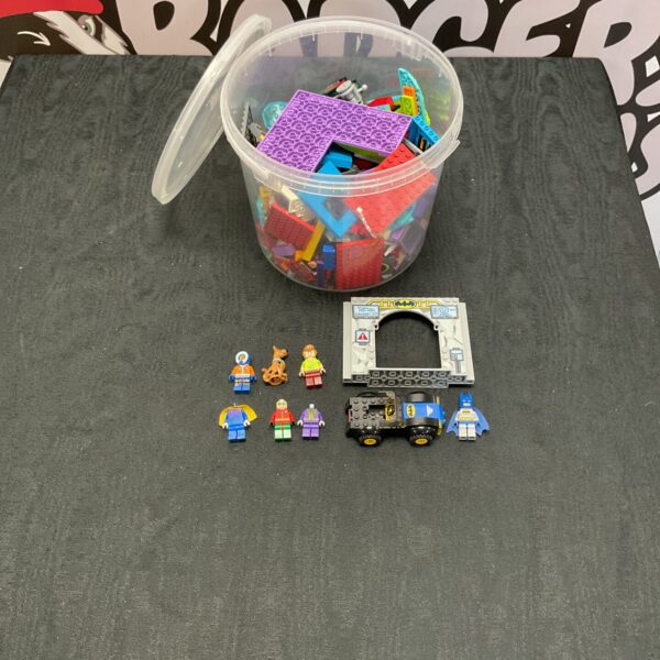 Mixed Lego lot with DC and Scooby Doo minifigures and colourful bricks.