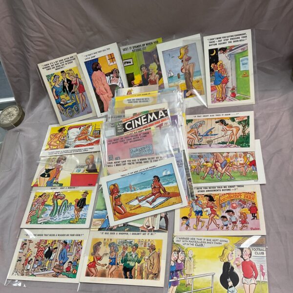 Lot of vintage seaside postcards with humorous illustrations.