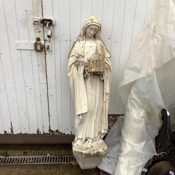 Vintage religious statue of the Madonna, detailed plaster figurine.
