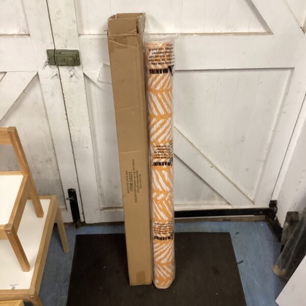 Unopened yellow and white outdoor rug measuring 120x180cm.