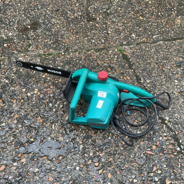 Used Bosch electric chainsaw for garden and DIY tasks.