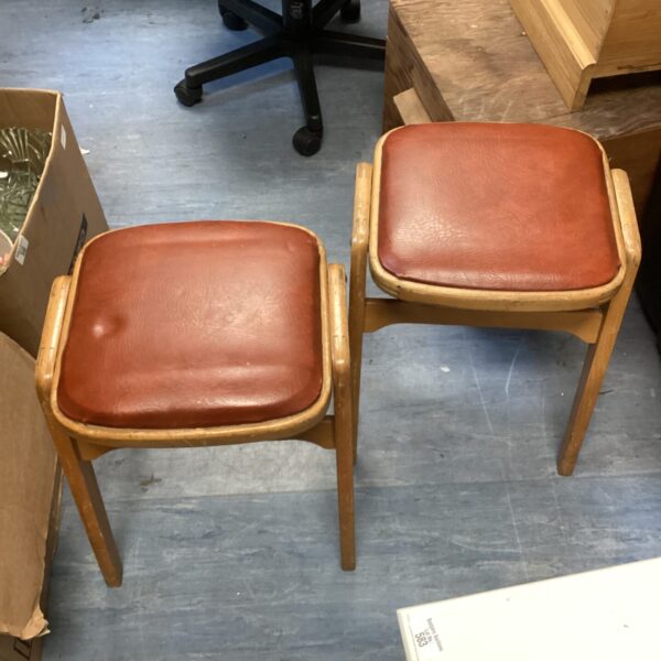 Pair of vintage leather topped stools with wooden frames.