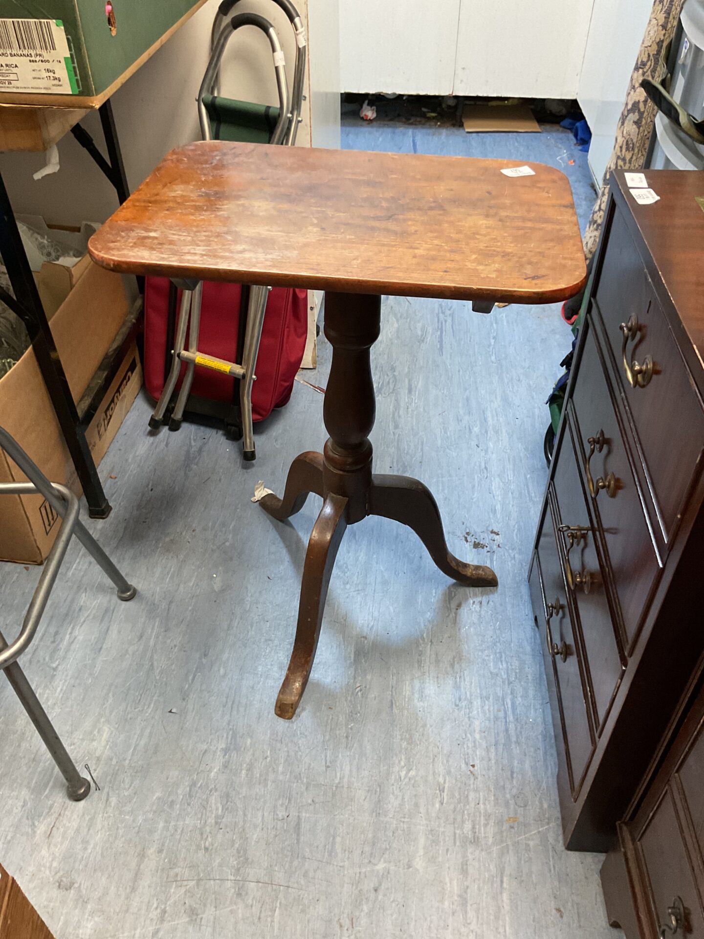 567 Antique mahogany three legged occasion table