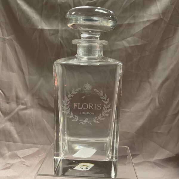 Vintage Floris London perfume bottle, clear glass, 9 inch height.