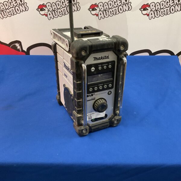 Makita 18v job site radio in used condition, portable and durable.