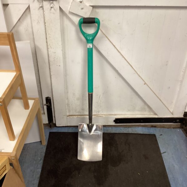 Stainless steel garden spade with a black handle, ideal for gardening.
