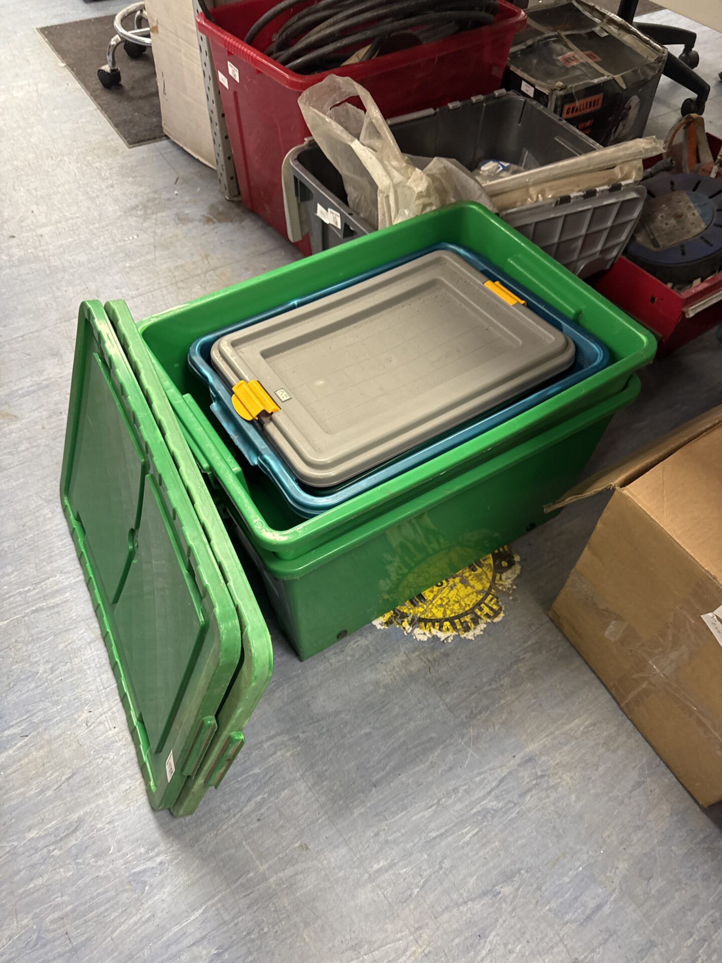 1145 Selection of plastic storage containers with some lids
