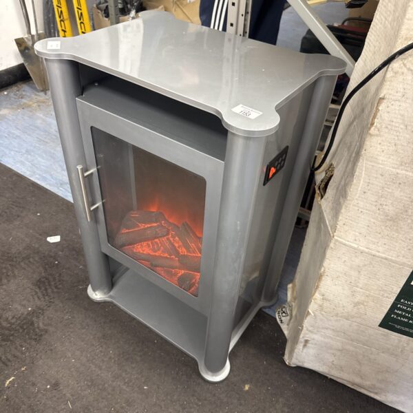 Tall electric fireplace heater with fan effect.