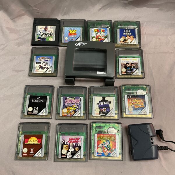 Vintage Gameboy Color games lot with accessories.