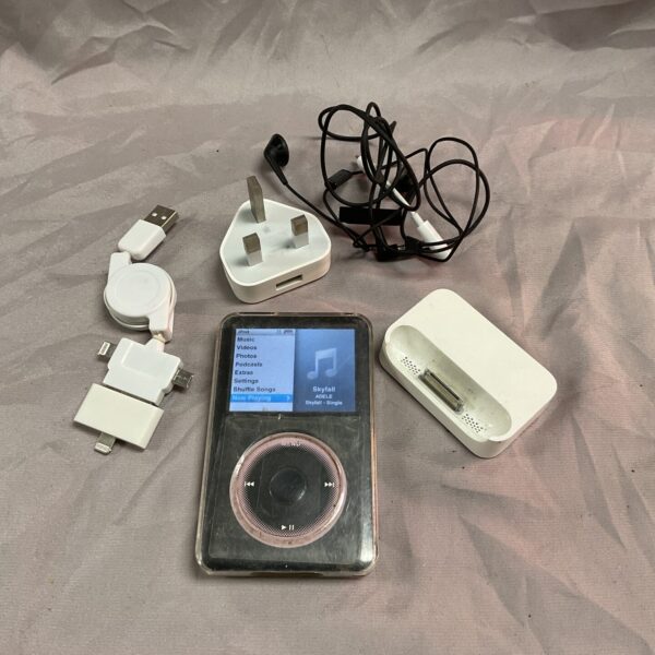 Apple iPod 80GB Classic with accessories, vintage portable music player.