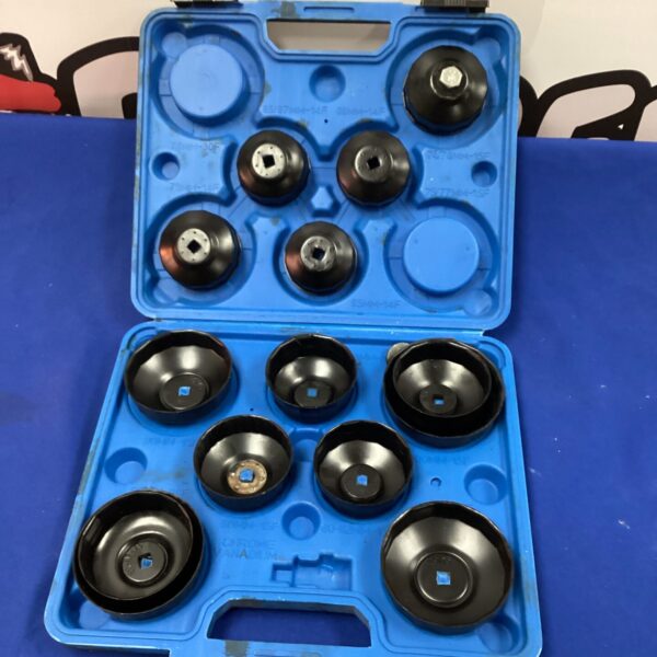 Blue plastic case containing an oil filter wrench kit with various wrenches.