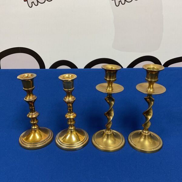 Vintage brass candlestick pair with twisted columns.