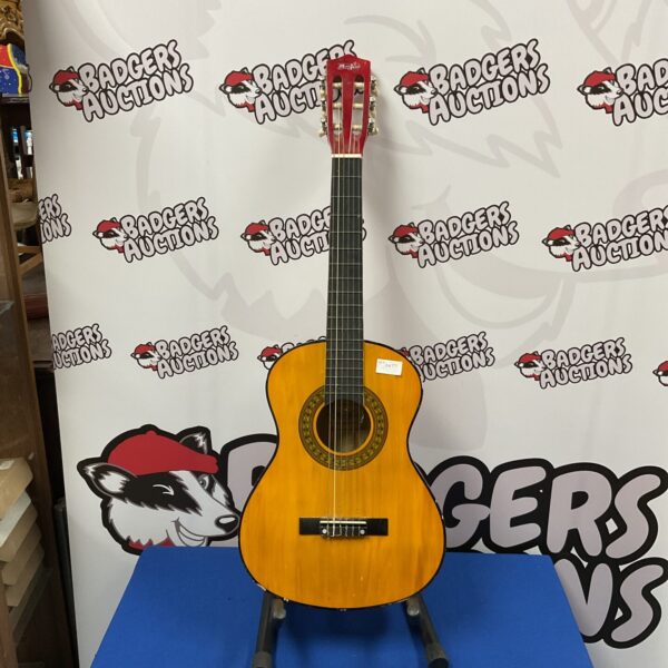Vintage Music Alley child's acoustic guitar for beginners.