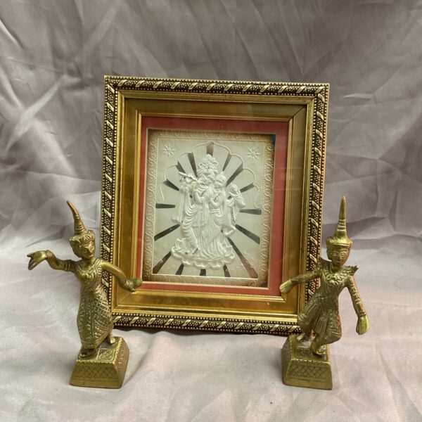 Brass Thai Siamese dancer figurines with gilt framed picture.